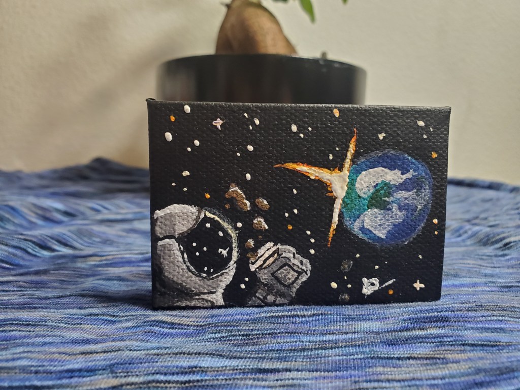 Small painting of an astronaut spilling coffee in space with the sun rising behind Earth.